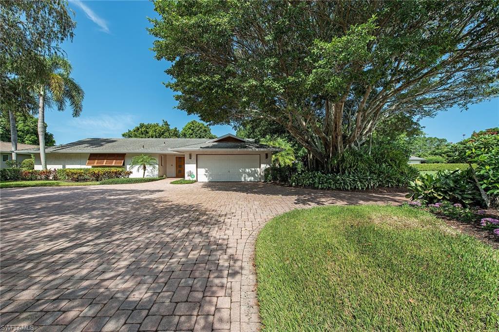 Enjoy this oversized corner lot in the Moorings at the intersection of Regatta Road and Riviera Drive.  The existing home has been updated through the years with premium appliances such as SubZero, Wolf and Miele.  The open floor plan allows for causal Florida living as well as more formal entertaining.  A recent swimming pool patio cage addition enhances the outdoor relaxation space.  The Moorings location is convenient to Old Naples, the Venetian Village and the Shops and Restaurants of Waterside.  Eligible for Moorings Beach Club membership.  Property to be sold as is.