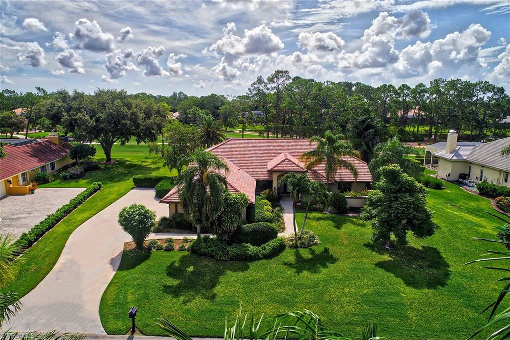 It’s all about the view. Not only do you enjoy two Arthur Hills championship golf courses in this prestigious gated community, but you also have the beauty of an oversized lot overlooking the 16th hole. Enjoy the many improvements made to this beautiful home including, newer interior and exterior paint, two air conditioners, hot water heater, rescreened pool cage and pool equipment, closets, roof, plantation shutters and Maytag dishwasher. Duct work was completely replaced. Sunlight abounds throughout the open floor plan with split bedrooms, huge family room with fireplace, gourmet kitchen to delight the inner chef in you with stainless steel appliances, oversized island with prep sink, two dishwashers, cedar pantry, granite countertops and wine cooler. Living areas bring the outdoors in with views of golf course and pool/spa. Enjoy formal dining for your entertainment pleasure, library/den and three-car garage. Quail Creek boasts every amenity imaginable, including clubhouse, pool/spa, fitness, spa services, tennis, bocce, dining and social activities. This residence offers optional golf and social membership. It is located close to I-75 and a home service warranty is included.