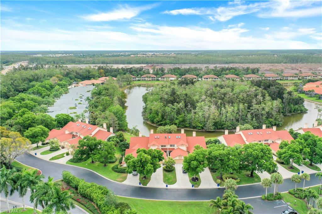 You can fall in love with this country in the city retreat as it is, or express your individuality in this charming townhome. Relax with ease from this lake front/island preserve view, offering 3BR/3B, 2 Car Garage w/private courtyard entrance, light and bright. Expansive eat in kitchen w/plenty of counter space, combo LR/DR w/fireplace and bar area, open floorplan for all your entertaining w/open view out to Florida Rm and beyond. Main level living also has 1B/1B plus Lndry Rm. Upstairs to Lge Loft area w/GBR/GBath and Lge Master Ensuite w/private deck overlooking tranquil lake w/reflections of the eastern sunrise.  “IYKYK” and if you don’t then you need to find out what Wildcat Run is all about…a social lifestyle like no other.  A private gated community set within meandering roads offering mature vegetation, fauna and flora abound. Social membership w/access to onsite restaurants, clubhouse, wellness ctr, tennis, bocce, swimming and ltd golf. AC’s 2018, W/D 2017, Refrig 2021, DW 2018, Condo replaced Roof 2017/2018. Make this your real estate reality, make this your new normal and appreciate all that SWFL has to offer, in Estero just east of I75 w/easy access to all you will need