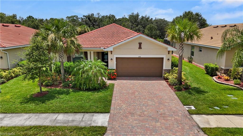 Welcome to easy Florida living in the sought-after, gated golf community of River Hall Country Club. This beautifully maintained 2022-built home offers 3 bedrooms, 3 baths, and 1,852 sq ft of thoughtfully designed living space on a split-bedroom floor plan, all being sold furnished.
Inside, tile flooring flows through the main living areas, complemented by an open kitchen with a large island, breakfast bar, granite counters, and stainless steel appliances—perfect for entertaining or casual everyday living. The primary suite features dual sinks and a walk-in shower, while the split-bedroom layout offers privacy for guests or family.
Enjoy Florida's outdoor lifestyle from the screened lanai and porch overlooking a peaceful, landscaped yard. A 2-car garage, paved driveway, and hurricane shutters add everyday convenience and peace of mind.
River Hall Country Club delivers a true resort lifestyle with amenities such as deeded golf membership, community pool and spa, clubhouse, restaurant, tennis and pickleball courts, bocce, and more—all wrapped in a friendly, amenity-rich neighborhood.
Whether you're looking for a full-time residence or seasonal retreat, this move-in ready home offers the perfect blend of comfort, and resort-style living.