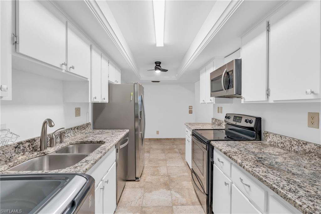 Reduced Price - Welcome to a fun, friendly sought after community, just three miles to Naples Pier. This home is ideal as a winter retreat, investment or for first time home buyers. It offers a screened in porch with gorgeous views of the Lakewood Country Club and a community pool. Also, this unit was just restored with a fresh coat of paint throughout, new carpeting, lighting and fans. It offers original tile throughout along with updated appliances and a large washer and dryer for your convenience. Lakewood is within walking distance to Publix, Bealls and Sugden Park as well as minutes to the world renowned Naples Pickleball Center at East Naples Community Park and the gorgeous Botanical Gardens.
Come and see this restored third floor corner unit right near the elevator, it is just the answer to affordable living in a friendly, quiet atmosphere.