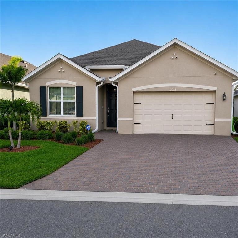 Motivated seller. Enjoy serene preserve views and a tranquil pond water feature from this beautifully upgraded 4-bed, 2-bath home in Magnolia Landing, available unfurnished or furnished. With 1,828 sq. ft. of bright living space (2,258 sq. ft. total), this home features plank-style tile flooring in the main areas, an easy-flow layout, and a large 15' x 25' extended screened lanai with pavers—perfect for relaxing or entertaining while enjoying the soothing sound of the water feature. The back of the home has a pond with a wooded area where you will see beautiful wildlife including eagles that come to the pond almost daily. The fenced yard with two gates, exterior roller shade, and added privacy landscaping create a peaceful outdoor retreat. Additional upgrades include an extended paver driveway, enhanced sprinkler system, upgraded gutters, alarm system with exterior camera (smart home), and ceiling fans in the living room, primary bedroom, lanai, and guest bedroom. The attic is storage-ready with a built-in access ladder. The primary suite includes two closets, including an oversized 7'5" x 8'10" walk-in. HOA fee includes lawn care, lawn irrigation, and cable TV, providing a low-maintenance lifestyle with no extra monthly contracts for these services. Magnolia Landing offers gated security, a championship golf course, resort-style pool, fitness center, and miles of walking paths. Furnishings convey as personal property at no monetary value.
