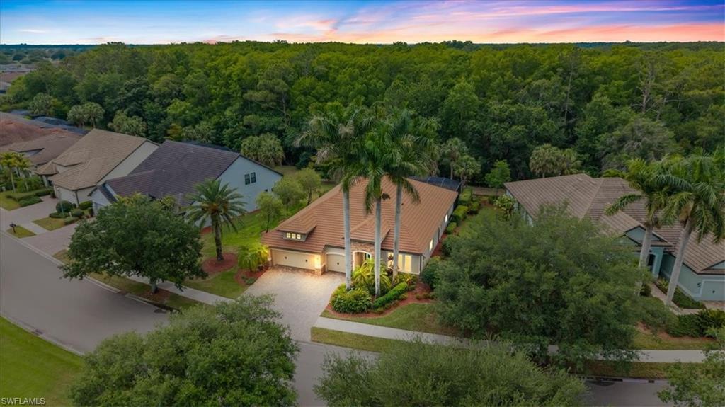 Old Florida charm with unique custom touches-that is what 16044 Herons View Drive delivers!  This turnkey property is being sold fully furnished and includes the golf cart, allowing you to immediately enjoy the River Hall lifestyle—golf, dining, and community amenities right at your fingertips. Perfectly positioned with a private southern rear exposure, this beautiful home offers 2,873 sf of indoor living space and lush private outdoor living space with a pool/spa and outdoor kitchen.
Step inside to discover elegant tile and real hardwood flooring throughout the main living areas. The spacious open floor plan and great room is accentuated with built-in shelving, a large kitchen island, an eat in kitchen and a designated dining space.
The home features two master suites, providing flexibility for multigenerational living, guests, or a private retreat. The primary bathroom has been beautifully remodeled with a luxurious walk-in shower and sleek frameless glass enclosure, offering spa-like elegance and modern convenience. A custom-built office with integrated desk and furniture provides a stylish and functional workspace. The primary bedroom has a custom closet and there is even a built in safe in the home.
Additional highlights include:
-Hurricane protection on the lanai for added peace of mind
-A newer roof (2021)
-Generous open living spaces and a highly desired street
Whether you're seeking a forever home or a premium Florida retreat, 16044 Herons View Drive delivers comfort, style, and low-maintenance luxury in one of southwest Florida's most enjoyable gated golf communities that continues to be a great value. The home is not in a flood zone and so flood insurance is not required. 
Schedule your private showing today and make this exceptional property yours!