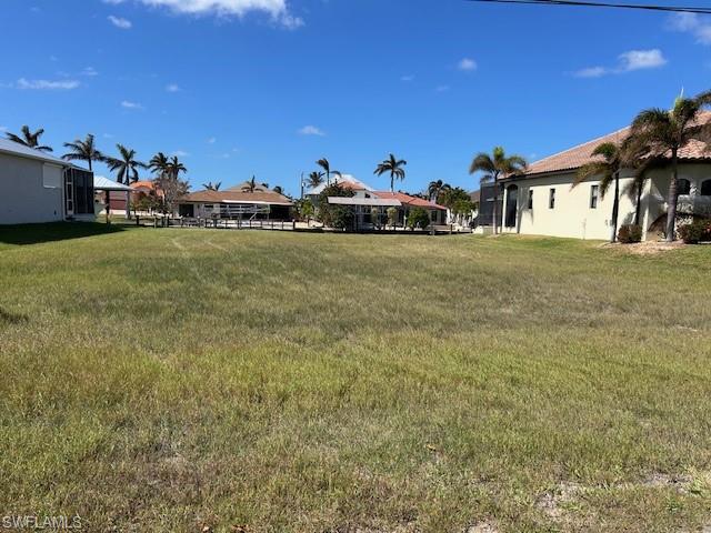 Build your tropical island dream home on this cleared Gulf access canal. This property is located in a gated community. Home site is located at the southern tip of St. James City, on Pine Island. Minutes to Sanibel, Captiva, Cabbage Key, Ft. Myers Beach and more . You will be boating to some of the best fishing spots and beautiful Beaches.