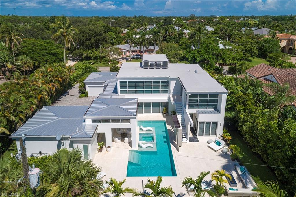 If a well situated spacious, private lot with lush mature landscaping coupled with a recently built contemporary home with sunlight pouring in from all directions is high on your list, then look no further than this nearly 4600 sq ft MHK-drawn masterpiece at 1531 Nautilus Rd in Coquina Sands. Completed in 2016, this 4 bed/ 6 bath (4 &2) residence is drawn with clean lines and adorned with a neutral palette and minimalist yet high quality finishes. With too many luxury appointments to mention, please view the virtual tour/video and make your appointment to see this incredible home today.