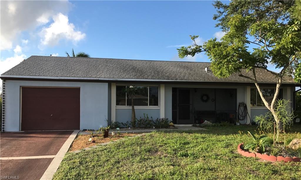 Southeast Cape Coral Country Club neighborhood and a short bike ride to downtown restaurants, shops and the Yacht Club Pier. This is a spacious 2 bedroom 2 bathroom home with a beautifully renovated kitchen. Large master bedroom with lots of light from the 8 foot picture window. Separate guest bedroom with it's own bathroom. French doors lead to an over-sized lanai that almost runs the length of the home and a yard with plenty of room for a pool. Owner widened driveway in 2008 and had maintained this home very well over the years.