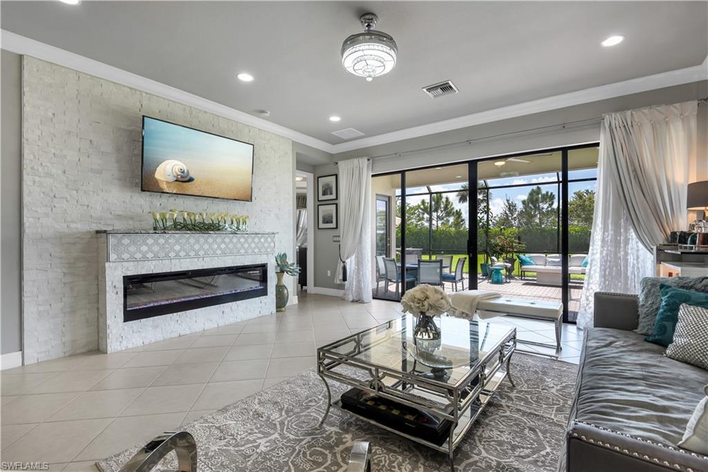 SWFL living at it's finest! This 2-story customized Newcastle model features stunning upgrades throughout and is being offered TURNKEY. This is a true 5 bedroom home! Situated on a premium oversized lot (one of the largest in community with over 1/3rd of an acre) and offering a cul-de-sac setting w/ low traffic, this home offers features that you will not find in any other home in the entire community - gourmet kitchen design (pot filler, LED cabinet lighting, designer cabinets, convection oven), great room layout on 1st floor w/ electric fireplace, formal dining room w/ bay window system, upgraded tile flooring, custom sliding glass doors on den/guest suite, and stunning outdoor living space w/ full summer kitchen, custom outdoor lighting, spa, and three fire pits. For storm protection all windows on front side of home are impact resistant and all other window have shutters, plus there is an entire home generator w/ a transfer switch. Stonecreek is a gated & deeded community that has a guard at gate 24/7 and offers resort style amenities - pool, lap pool, tennis courts, indoor & outdoor basketball courts, splash pool, covered playground, & more.