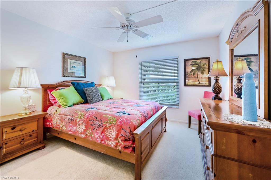 Quaint 2 bedroom, 2 bath, first floor condo offered turnkey in this 55+ community.  Nicely kept and a nice view of the lush landscaping and pool area.  This split bedroom floorplan allows privacy for all parties.  The windows and doors in the front are impact glass.  Newer A/C unit and tankless water heater, stackable washer/dryer and nice updates.  Amenities galore with tennis, pool, shuffleboard and more