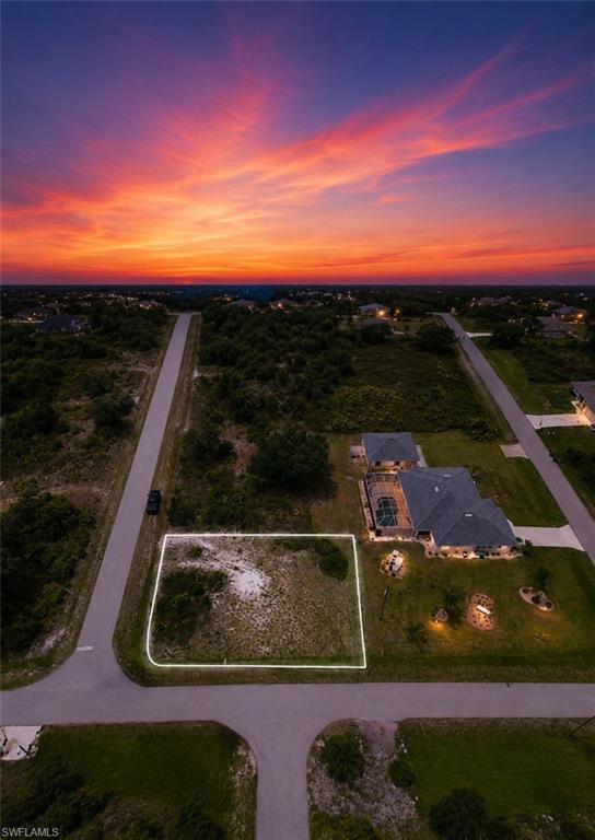 Positioned on a desirable corner homesite in the growing Peace River Shores area, this residential lot offers an outstanding opportunity to build a custom Florida home in a peaceful setting surrounded by established and newer residences. With approximately 0.27 acres and paved road frontage, the property provides flexibility for a variety of home designs while maintaining a sense of space and privacy.

Conveniently located near public boat ramps, parks, shopping, dining, and major travel routes, this location combines everyday convenience with easy access to the outdoor lifestyle Southwest Florida is known for. Whether you're looking to build now or secure land for the future, this property presents a compelling opportunity in an area experiencing continued growth and development.

No HOA fees. Buyer to perform all due diligence regarding zoning, environmental conditions, utility availability, building requirements, lot dimensions, and future land use.