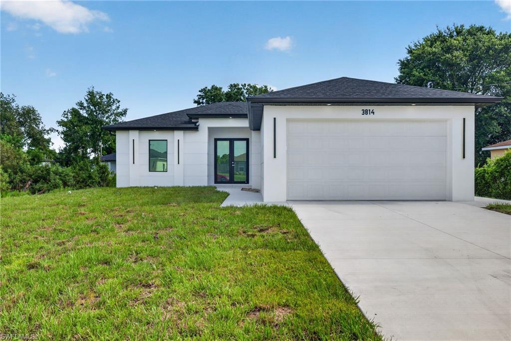 SELLER IS HELPING WITH CLOSING COSTS! Beautiful new construction home located in the rapidly growing area of Lehigh Acres. This stunning property features 3 bedrooms, 2 bathrooms. Enjoy an open-concept floor plan with modern finishes, abundant natural light, spacious living areas, a beautifully designed kitchen, and a private primary suite. Additional features include impact-resistant windows and doors, a covered lanai, and a 2-car garage.