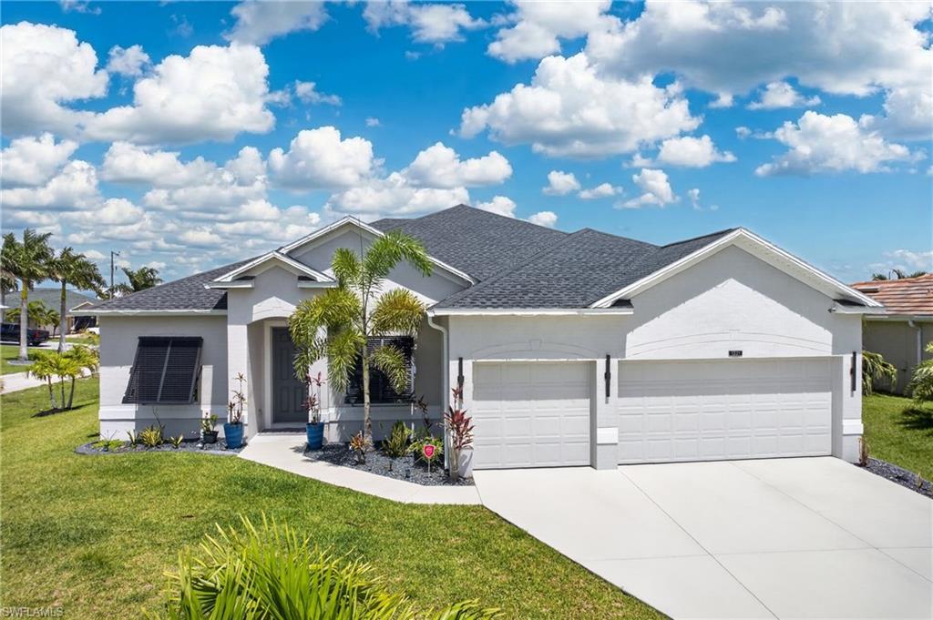 Live surrounded by some of Northwest Cape Coral’s most impressive Gulf access estates—located west of Old Burnt Store Rd in an area known for luxury waterfront living and beautiful custom homes.

This spacious residence offers 4 large bedrooms + den with a thoughtful split-bedroom design and upscale finishes throughout. The private owner’s retreat features dual closets and an elegant spa-style bath with dual vanities, soaking tub, and separate walk-in shower. Guests will appreciate the private en suite bedroom, creating comfort and flexibility for family or visitors. 
The open great room floor plan showcases high ceilings, crown molding, and a spacious kitchen complete with breakfast seating, bar seating area, and premium Samsung appliances including a built-in double wall oven. An indoor utility room and mudroom add convenience and everyday functionality. The den is separated from the main living area by french doors.


Step outside to your own tropical escape. The screen-enclosed outdoor living area features a covered lanai, heated saltwater pool, built-in spa/hot tub, and LED lighting— the extended pavered pool deck offers plenty of extra room for lounging poolside. 

Additional highlights include:
• Impact glass windows and doors
• 3-car garage
• Indoor laundry + mudroom
• Seller is including a 98" QLED Smart Television (purchased about 1 year ago) that's mounted to the wall in the main living area.

Luxury, comfort, and move-in-ready convenience in one of NW Cape Coral’s most desirable neighborhoods.