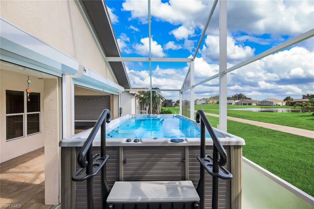 Welcome to your own slice of paradise in the gated community of Sabal Springs Golf and Racquet Club, where resort-style living awaits. Enjoy an exceptional lifestyle with access to golf, tennis, pickleball, a beautiful clubhouse with dining, fitness center, and a sparkling community pool and spa. This beautifully appointed home features elegant high ceilings accented with crown molding, creating a bright and sophisticated atmosphere throughout. Step outside to your private screened lanai and unwind in your own relaxing spa - the perfect place to enjoy peaceful mornings or serene evenings in complete comfort. Experience luxury, comfort, and the Florida lifestyle all in one beautiful home.