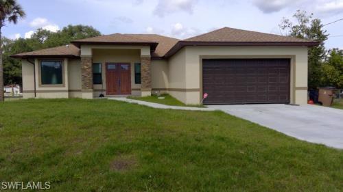 Newer home for sale in the Buckingham area with acreage across the street.  Built in 2019 with close to 2000 sq ft, featuring Double entry doors, Granite counters, 4 bedrooms, 2 bathrooms, 2 car garage, fenced, screened in under truss lanai and above ground swimming pool.  Located 5 minutes from I-75 and 15 minutes from Downtown Fort Myers.
