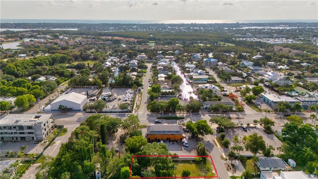 Approximately 0.15 acres zoned residential for single-family or duplex development. This fully upland, level lot offers public utilities and NO HOA, creating an exceptional opportunity to build in the rapidly growing Bayshore District of Naples. Located at 2960 Coco Avenue, this homesite is surrounded by new coastal-inspired construction and luxury residences, making it the perfect setting for a custom home tailored to your lifestyle providing endless potential. Minutes from Downtown Naples, 5th Avenue South, Gulf beaches, marinas, dining, shopping, and entertainment, the location offers both convenience and long-term value. Enjoy close proximity to Celebration Park, Naples Botanical Garden, Rebecca's Wine & Jazz Bar, local cafés, art galleries, and the expanding collection of restaurants and lifestyle destinations that continue to transform the Bayshore area. With inventory becoming increasingly limited in this evolving area, 2960 Coco Avenue presents a rare opportunity to secure a prime piece of Naples real estate and build your dream home!