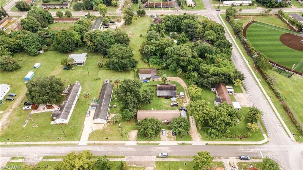 A great opportunity to own a diverse portfolio featuring five rental units all on one property, including a triplex building (3 1 bedroom 1 bath units) and two single-family homes (a 3 bed 1 bath and a 2+den 1 bath), with a total monthly rental income of $7,200. Situated just outside of Page Field, this is a great central Fort Myers location! All properties boast new roofs and many have remodeled, updated interiors, ensuring modern amenities and reliable maintenance. This collection offers stable cash flow and attractive, move-in-ready residences in desirable areas. Perfect for investors seeking a well-maintained, high-quality rental portfolio.
