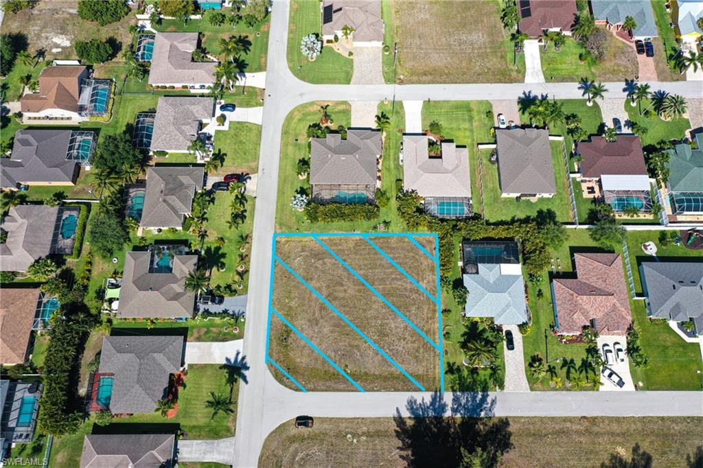 Location, Location, Location! Fantastic opportunity to build your dream home on an OVERSIZED, CORNER, TRIPLE LOT located in the heart of Southwest Cape Coral. All assessments for this property have been paid. Call today for your private tour!