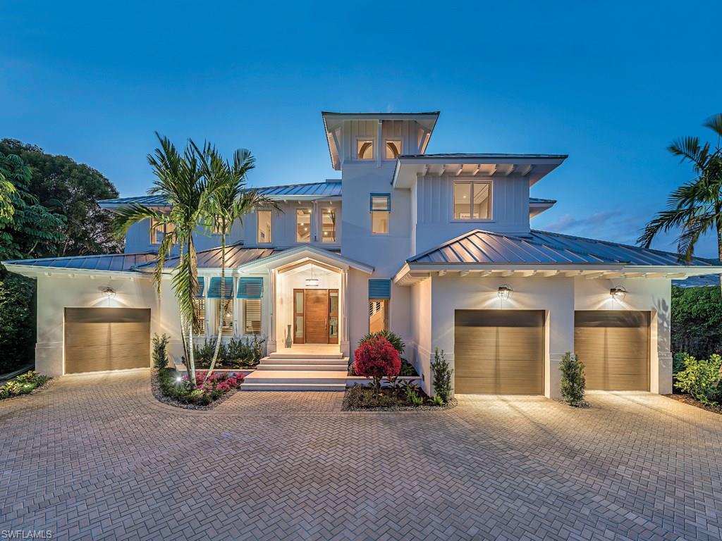 Park Shore’s most prestigious custom retreat crafted by Naples' finest artisans is now available. Penned
by famous architect Matt Kragh and constructed by renowned Waterside Builders, the Old Florida style home
has been masterfully completed by award-winning Lisa Ficarra of Ficarra Design Associates. Boasting
soaring ceilings and a relaxing open floor plan, the cul-du-sac setting promises peaceful privacy. Wide open floor plan with Legno Bastone floors flows seamlessly for easy living from the kitchen to the master wing. The master wing is truly custom with a pecky Cypress backdrop in the bedroom with a Mother of Pearl and shell stone floors and walls adorning the oversized master bathroom. Three 2nd floor bedrooms with stylish bathrooms en suite. A 200’ wide rear yard-outdoor living area is ideal for entertaining with a full outdoor kitchen, grille, dramatic fireplace with oversized pool and spa bathed in western exposure sun. Ficarra Design delivers an unsurpassed turnkey vacation home in one of Naples’ finest luxury communities. This luxurious retreat is ideally located close to the Waterside Shops, Venetian Village, the beach, boating and all that makes Naples paradise.