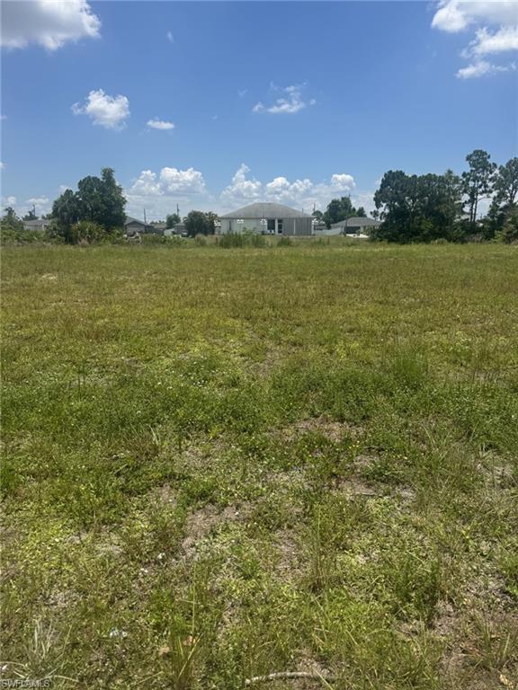 Build your vision on this beautiful waterfront vacant lot in NE Cape Coral, offering serene water views and endless potential. This cleared residential parcel is tucked away on a quiet street surrounded by newer homes, providing the perfect setting to build your dream home or hold as a long-term investment. Enjoy fishing right from your backyard and the peaceful waterfront lifestyle every day. Located in an X Flood Zone, this property offers added peace of mind and greater flexibility for future building. With NO HOA and plenty of room to create your ideal home, this is an exceptional opportunity to own waterfront property in one of Cape Coral’s fastest-growing areas