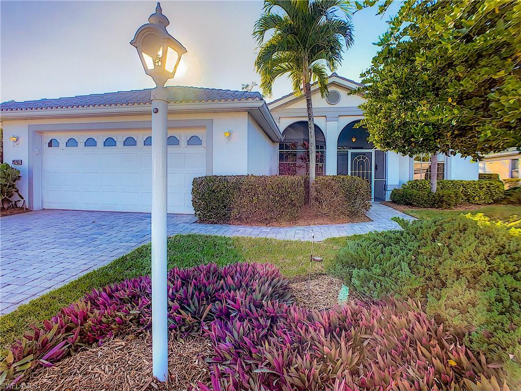 Fan favorite Ibis II home in HERONS GLEN Country Club with open floor plan, 2 bedrooms + DEN, separate laundry room, and split bedroom layout. This home also boasts a 17’ x 27’ tiled, UNDER AIR Florida Room overlooking a private preserve. The Florida Room flows off the great room, creating a fantastic venue for entertaining or to simply relax with your favorite companion. If you love Florida’s indoor-outdoor living, you’ll also love the screened front loggia, and the private paver patio area with garden arbor. Inside you’ll find a fresh and bright color scheme throughout the home with upgraded fans and lights, and tile and wood grain laminate flooring. There are newer STAINLESS appliances in the cheerful kitchen and filtered water to the sink and fridge. The hot water heater is new, garage has built in storage, and the lot is oversized. Come enjoy the active community of Herons Glen where the residents own the facilities and amenities are second to none, including Clubhouse, Restaurant, Lounge, Bocce, Shuffleboard, Pickleball, Billiards, 6 HarTru Tennis Courts, craft & card rooms, Heated Pool/Spa and Championship Course Golf is optional. CALL TODAY for your private showing.