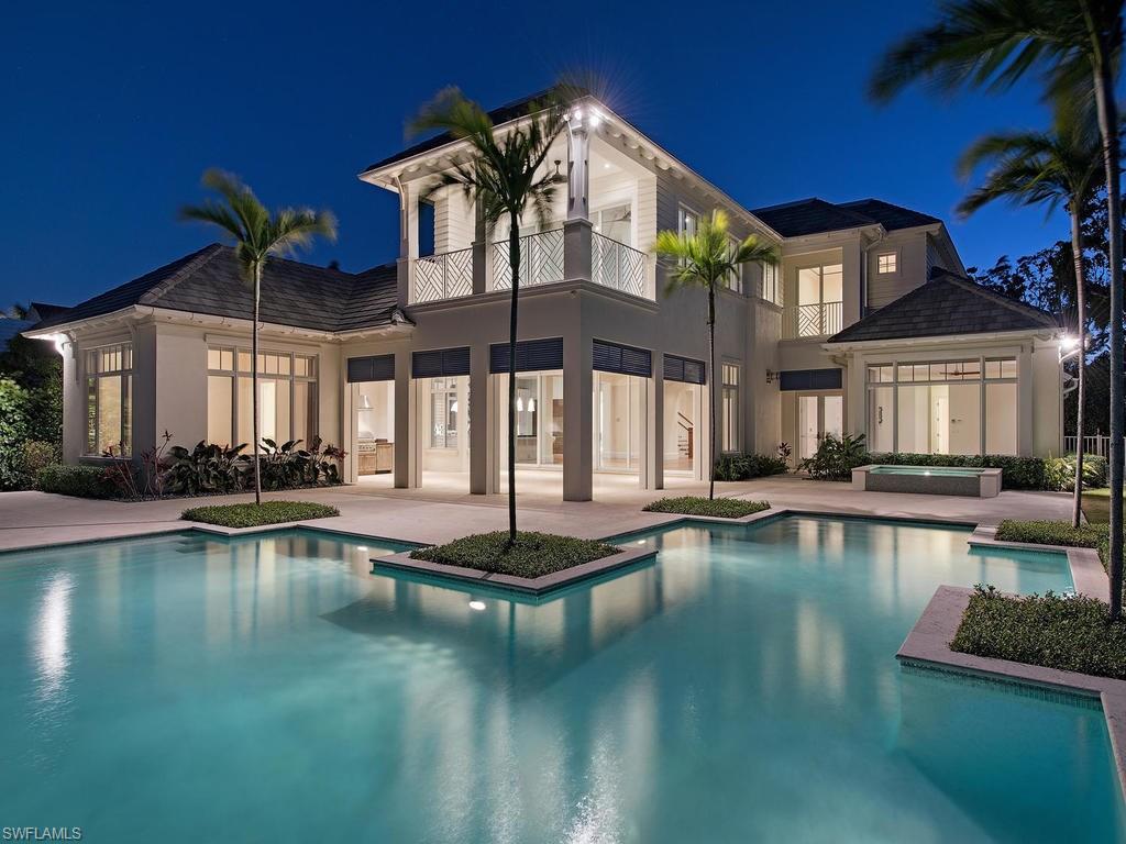 An artful conception of both inspiration and architecture,this masterfully designed home by Stofft Cooney incorporates modern luxury with traditional elements & combines indoor and outdoor living with lush yet practical accommodations.Top-of-the-line chef's kitchen is clad with premium finishes & fixtures including custom cabinetry, Volga Blue Granite & Quartzite countertops,Wolf 6-burner gas range, pot filler,Wolf microwave & steamer,Subzero refrigerator,Miele dishwasher,Fisher & Pakel dishdrawer, butlers pantry, reverse osmosis system.Gracious living/family room with gas fireplace, sliding glass doors that open onto the spacious lanai, Fisher & Pakel stainless gas grill,Titan automatic screens,auto storm shutters,infinity edge salt water pool & spa, cabana. Intimate dining room & completely redone contemporary wine room. Private master suite on the main level, and three guest suites on the second level. Whole house water filtration system, reverse osmosis in kitchen, whole house generator, whole house surge protector, new dock & 20,000# lift plus 1,500# lift with 180 degree swivel. Port Royal membership eligibility.