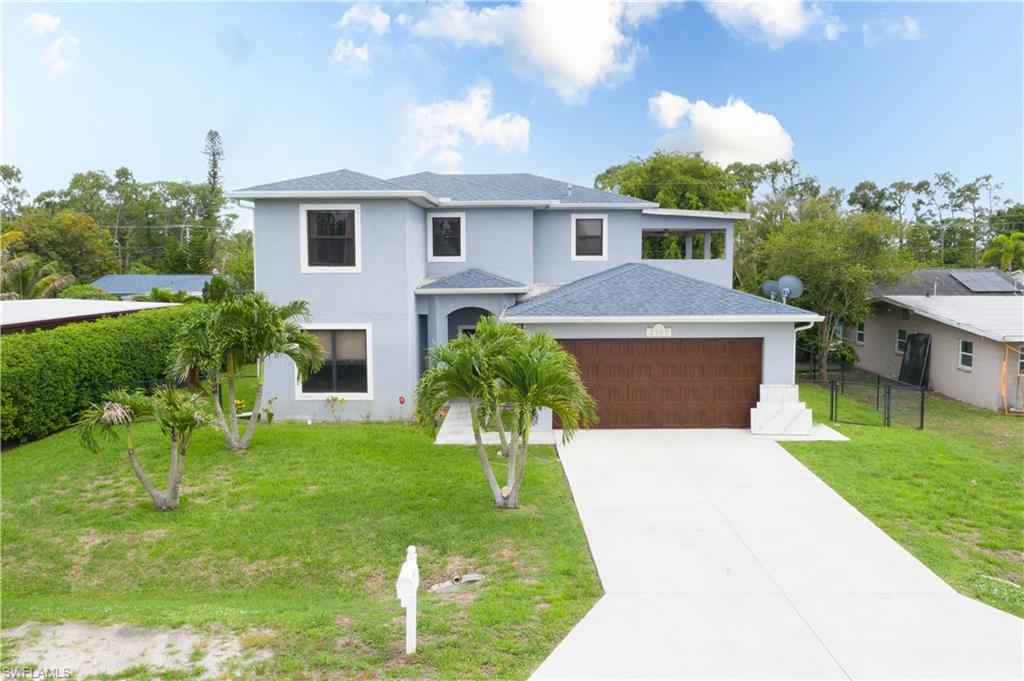 Welcome to 2360 Burton Avenue, a spacious and beautifully updated home offering the perfect combination of modern upgrades, flexible living space, and peace of mind. Designed with functionality in mind, the first floor features a highly desirable bedroom and full bathroom, making it ideal for guests, multi-generational living, or a private home office setup. A separate den offers additional flexibility and can be used as a home office, playroom, gym, or media room. The updated interior showcases modern finishes and thoughtful improvements throughout, creating a move-in-ready living experience. The spacious kitchen opens to the main living areas, making it perfect for entertaining and everyday living. Upstairs, you'll find three additional bedrooms and three full bathrooms, providing plenty of space and privacy for family members and guests. The generous layout offers room to spread out while maintaining a comfortable and functional flow. Enjoy Florida's beautiful weather year-round from the screened-in porch, perfect for morning coffee or evening relaxation. The upper deck provides additional outdoor space for entertaining or enjoying sunset views. The fully fenced backyard offers privacy and plenty of room for pets, children, gardening, or future outdoor enhancements. Conveniently located near shopping, dining, schools, parks, downtown Fort Myers, Gulf Coast Town Center, RSW International Airport, and Southwest Florida's world-famous beaches, this home offers the perfect blend of location, space, and value.