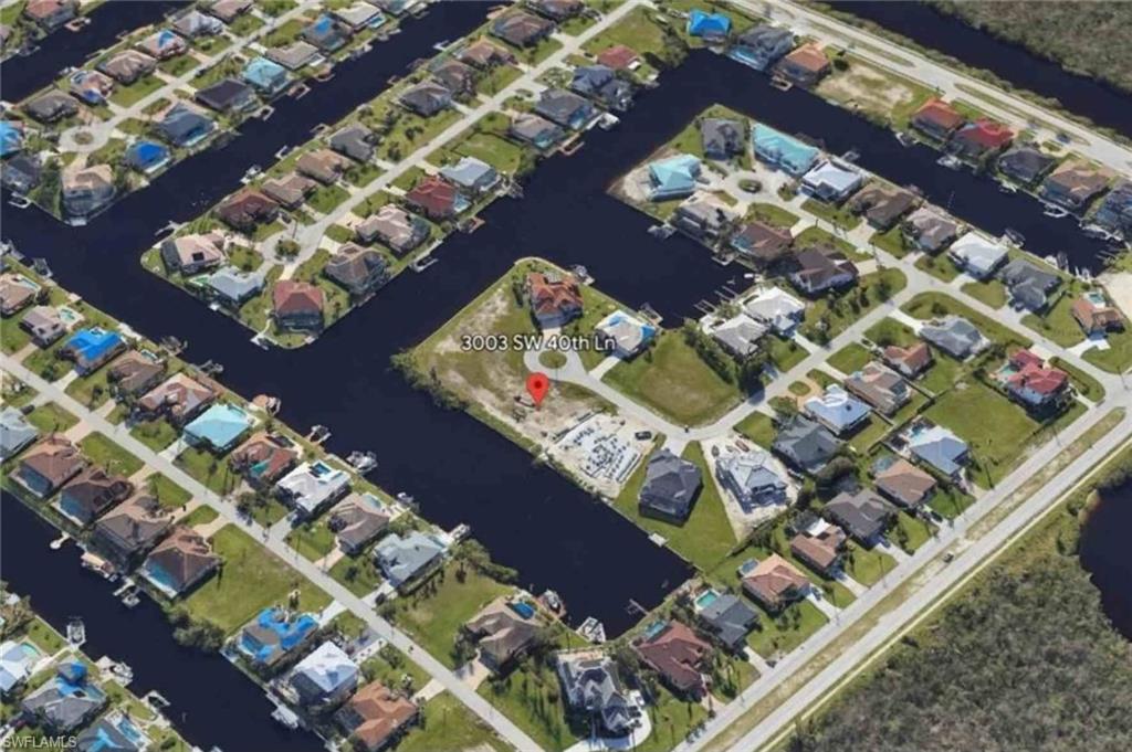 WATERFRONT PARADISE AWAITS
Rare opportunity to own an oversized Gulf access lot in one of Southwest Cape Coral’s most desirable waterfront neighborhoods. Perfectly positioned on a quiet cul de sac, this exceptional property offers stunning intersecting canal views and the ideal setting to build the custom home you've always envisioned.
A brand new 120 foot seawall is already in place, and all assessments have been paid in full, providing significant value and peace of mind for the future owner.
Property Highlights:
• Oversized Gulf access lot
• Brand new 120 foot seawall
• All assessments paid in full
• Prime Southwest Cape Coral location
• Quiet cul de sac setting
• Beautiful intersecting canal views
• Surrounded by spacious waterfront homes
• Ideal location for boating enthusiasts
Whether you're looking to build your dream waterfront estate or make a smart investment in one of Southwest Florida’s most sought after areas, this property offers an unmatched combination of location, views, and value.
Opportunities like this are becoming increasingly rare. Secure your piece of paradise and start building the waterfront lifestyle you've been dreaming of.