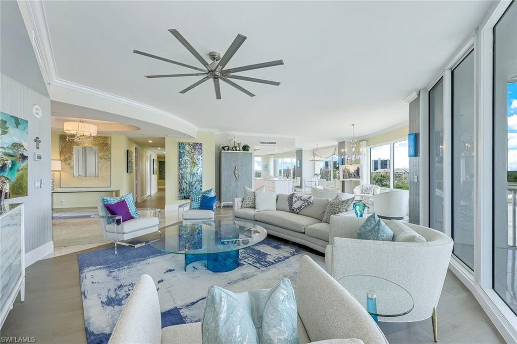 Welcome to paradise! This BEAUTIFUL residence features 3BR, 3.5BA, plus DEN, offering 4,171 SQ FT of LUXURIOUS LIVING! Be enchanted by the view of Wiggins Pass & a slice of the Gulf of Mexico, providing the backdrop for an idyllic COASTAL lifestyle. Discover an impeccably designed interior with Clive Daniel's furnishings, elegant WOLF, MIELE & SUB ZERO appliances, stunning finishes including MARBLE & QUARTZ, & magnificent Chihuly-style lighting to create an ambiance of sophistication & comfort, making it a dream come true! THE AQUA, home to SUITE 501 and PET FRIENDLY, offers an INFINITY POOL, spa, sauna & steam rooms, state-of-the-art FITNESS CENTER, kayaks, THEATER, CLUB, & BILLIARDS room. The 24 HR CONCIERGE ensures a life of ease! All of this is in NAPLES, offering a charming atmosphere, fine dining, & upscale shopping. Enjoy the arts scene, world-class golf, & pristine beaches. Embrace coastal living with SUNSETS, thrilling water sports, & SANDY SHORES with gentle waves. It's a haven for nature lovers & outdoor lovers. The quick access to RSW airport also ensures easy travel connections, making jet-setting a breeze. SEE video!  Suite 501, The Aqua, & Naples await you to enjoy!
