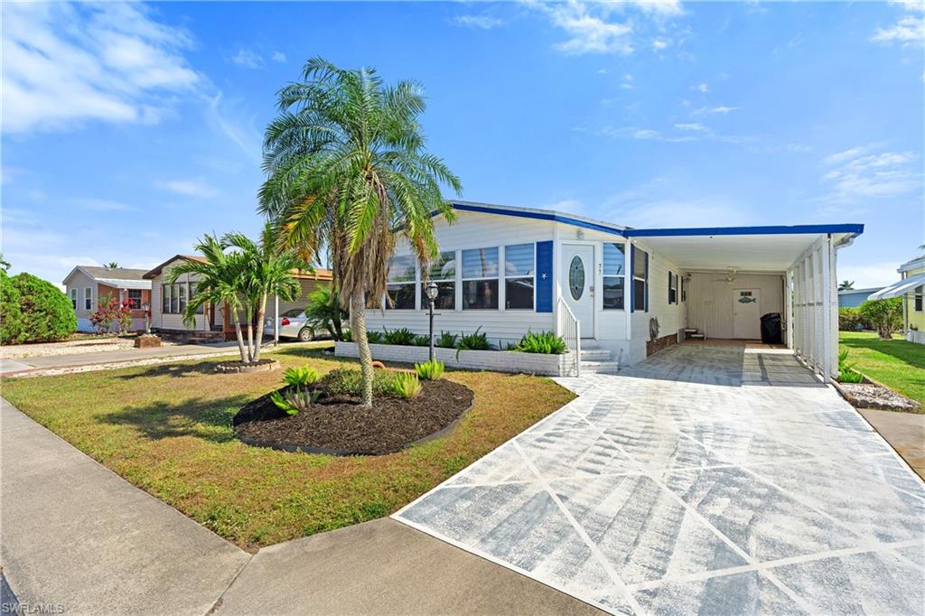 This beautifully renovated 2-Bedroom plus Den, 2-Bathroom home is located in the highly sought-after 55+ community of Windjammer Village of Naples. This vibrant and friendly community offers low HOA fees, affordable living and well-maintained surroundings, making it the perfect place to enjoy the Florida lifestyle!

Offered completely turnkey and move-in ready, with extensive recent upgrades throughout. These improvements include a new tankless water heater, a new electrical panel, new ceiling fans, updated windows and interior doors and a fully renovated primary bedroom, ensuite bathroom and more.

Centrally located, offering unbeatable access to world-class dining, shopping, white-sand beaches and everything that makes Southwest Florida such a desirable destination. All the hard work has been done—this charming home is ready for you to move in and start living your Naples dream!
