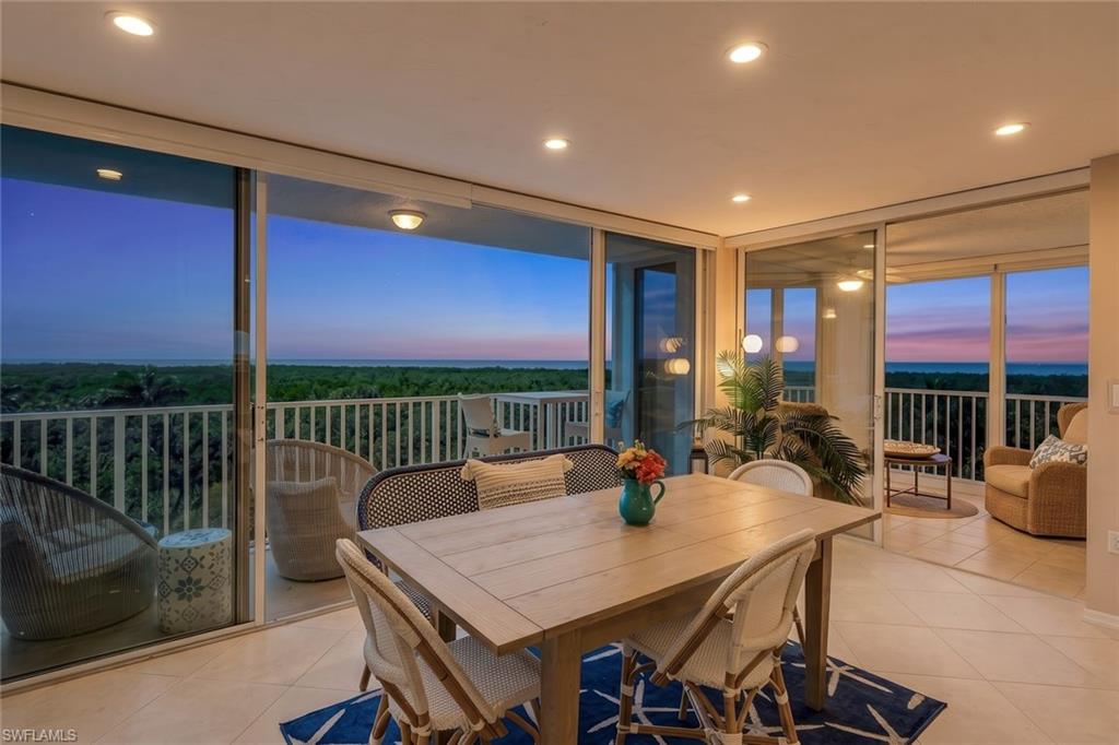 Perfectly positioned in one of Pelican Bay's most desirable and centrally located high-rise communities, this St. Lucia residence offers the rare advantage of being just steps from the Commons Center and tram station, with a private walkway providing effortless access to Pelican Bay's renowned beach amenities. Combined with distant Gulf views, coastal breezes, and an exceptional array of resident privileges, this residence presents an outstanding opportunity to enjoy one of Naples' most coveted lifestyles. Although designated as a 5th-floor unit, the building's unique architectural design—with parking levels and the main lobby situated below—positions the residence at an elevation comparable to a 7th floor, providing enhanced views, abundant natural light, and added privacy. The light-filled floor plan features spacious living and dining areas designed for both everyday living and effortless entertaining. The primary suite serves as a private retreat, complete with a dedicated vanity area and an expansive walk-in closet. A thoughtfully designed guest bedroom offers privacy and flexibility, with a pocket door that creates a comfortable en-suite experience for family and visitors alike. The glass-enclosed lanai extends the living space and provides the perfect setting to relax and enjoy tranquil views, coastal breezes, and stunning Southwest Florida sunsets. Residents of St. Lucia enjoy an impressive array of amenities, including a saltwater pool, social room, billiards room, library, card room, two guest suites, and professional on-site management. As a resident of Pelican Bay, you'll enjoy exclusive access to private beachfront restaurants, attended beach services, 18 Har-Tru tennis courts, pickleball center, a state-of-the-art fitness center, and miles of scenic walking and biking. Premier cultural, dining, and shopping destinations—including Artis—Naples, Waterside Shops, and Mercato—are just minutes away. Offering an exceptional location, desirable floor plan, and access to one of Naples' most sought-after communities, this residence presents a rare opportunity to experience luxury coastal living at its finest. Whether as a seasonal retreat or a year-round residence, this home embodies the effortless elegance and unparalleled lifestyle that make Pelican Bay one of Southwest Florida's premier addresses.