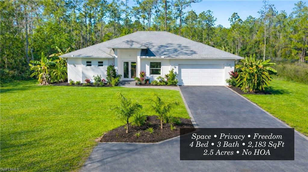Located in a prime and rapidly growing area of Naples, this well-maintained 4-bedroom, 3-bath residence sits on 2.58 private acres and offers
the space, flexibility, and freedom buyers are seeking—without HOA restrictions. With approximately 2,200 square feet under air, the openconcept layout is designed for both everyday living and entertaining. The kitchen opens seamlessly to the main living and dining areas, creating
a functional and inviting flow. The spacious primary suite provides a private retreat with dual walk-in closets, a soaking tub, and double vanities.
Additional bedrooms are well-proportioned and offer flexibility for guests, home office, or multi-generational living. Enjoy year-round outdoor
living from the screened lanai with dual ceiling fans, overlooking peaceful surroundings. The home is equipped with a whole-house reverse
osmosis water filtration system, generator-ready hookup, and an attached garage with ample storage. Outdoors, the expansive acreage
features mature fruit trees, cleared areas, and abundant room for future improvements such as a guest house, barn, workshop, or garden.
Conveniently located near gas stations, newly developed grocery stores, dining options, and everyday essentials, with easy access to major
roadways. Ave Maria University is approximately 15 minutes away, and Big Corkscrew Regional Park—a $178 million regional destination with a
water park, sports fields, and recreational amenities—is just minutes from the property. A nearby sheriff substation further enhances the area’s
appeal. A unique opportunity to own usable acreage in a high-growth location while remaining close to everything Naples has to offer. Schedule
your private showing today.