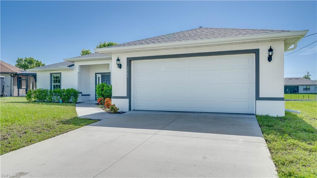 Incredible, like-new waterfront home situated on a freshwater canal with desirable eastern exposure! Enjoy peaceful canal views and the Florida lifestyle from your own backyard.  
This thoughtfully designed home features a spacious primary bedroom with a private bath, a guest en-suite bedroom, two additional guest bedrooms, and a full guest bath. The bright, open-concept floor plan is filled with natural light and neutral finishes, providing the perfect canvas for your personal style.
The beautifully appointed kitchen features a French-door drawer refrigerator, ample cabinetry, and a large island that's perfect for entertaining, casual dining, or everyday living.  Best of all, this home is located in an area where flood insurance is not currently required by most lenders. Don't miss this opportunity to own your own waterfront paradise!