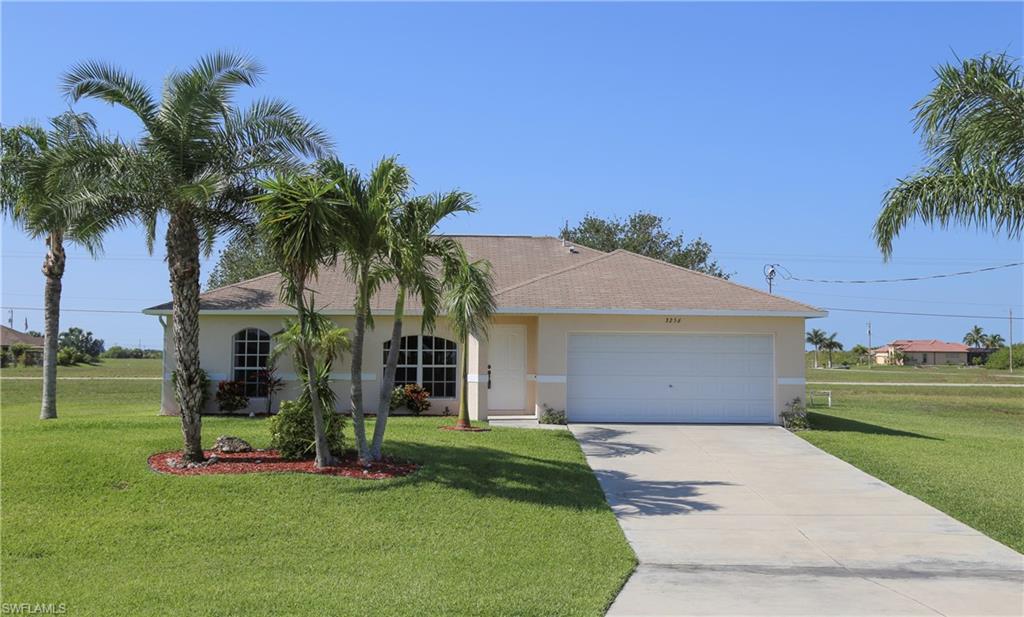 Fabulous 3 bed + Den/2 bath home with plenty of room to add a pool. This lovely home has well maintained and ready for move in! Offering a great room floor plan and open kitchen with breakfast bar. French doors open to a den that could be used as office or even another guest room. The home is located on a 3 lot site in the desired NW Cape around Gulf access canals. Just a short drive the golfing, shopping, and restaurants. This home is a must see.