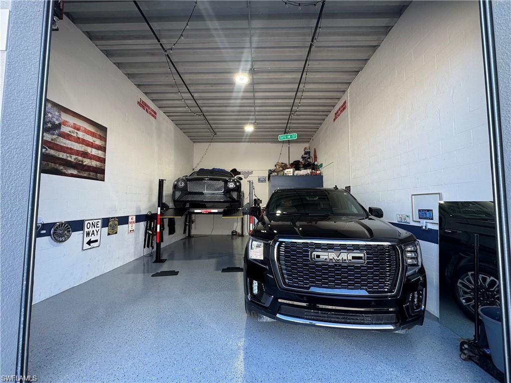 Now available at Toy Vault in Fort Myers, this 554-square-foot luxury car condominium offers a rare opportunity to own secure, private vehicle storage in one of Southwest Florida's most sought-after automotive communities. Whether you're storing an exotic car, classic car, motorcycle, boat, or specialty vehicle, this unit provides the security, flexibility, and convenience enthusiasts are looking for.

The unit features durable epoxy floors, more than 14-foot ceiling heights, bright overhead lighting, and an oversized roll-up garage door for easy access. The generous ceiling clearance also provides the opportunity to add a loft or mezzanine, creating additional storage, office, lounge, or workspace. A private restroom is already in place with the ability to add a shower, and the unit includes dedicated private WiFi for added convenience.

Toy Vault was designed specifically for automotive enthusiasts and offers a gated, secure environment with coded entry access, 24-hour security personnel, surveillance cameras, and a community gathering area perfect for meetings, events, and networking with fellow owners. Even better, association fees are only $1,064 per year and include water, making this one of the most affordable ownership opportunities in the luxury car condo market.

Conveniently located just off US-41 near Alico Road with quick access to I-75, Southwest Florida International Airport (RSW), Fort Myers, Naples, and Cape Coral, this property offers both convenience and long-term value.

Luxury car condominiums in Toy Vault rarely become available, and demand for secure vehicle storage continues to grow throughout Southwest Florida.


#ToyVaultFortMyers #LuxuryCarCondo #CarStorage #FortMyersRealEstate #AutoCondo