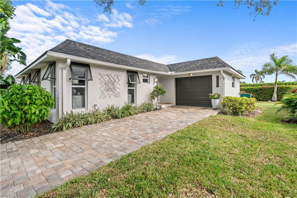 Ideally located just minutes from downtown Naples, this beautifully updated villa-style residence offers an exceptional combination of value, convenience, and lifestyle in one of the area's most sought-after locations. With 5th Avenue South, world-class dining, boutique shopping, and Naples’ award-winning beaches just a short drive away, you'll enjoy the very best of coastal living. The vibrant Bayshore Arts District, known for its local restaurants, galleries, and waterfront charm, is also just a quick bike ride from your doorstep. One of the few villa-style opportunities in this price range this close to downtown Naples, the home features its own private parking garage and showcases high-end finishes throughout, creating a comfortable yet elevated living experience. Inside, you'll find a thoughtfully designed floor plan with spacious living areas that flow seamlessly for both everyday living and entertaining. Step outside to your private outdoor retreat, the perfect space to unwind, enjoy the Florida sunshine, or host family and friends. Whether you're searching for a full-time residence, seasonal getaway, or investment property, this home delivers the ideal blend of location, style, and convenience in the heart of Naples.