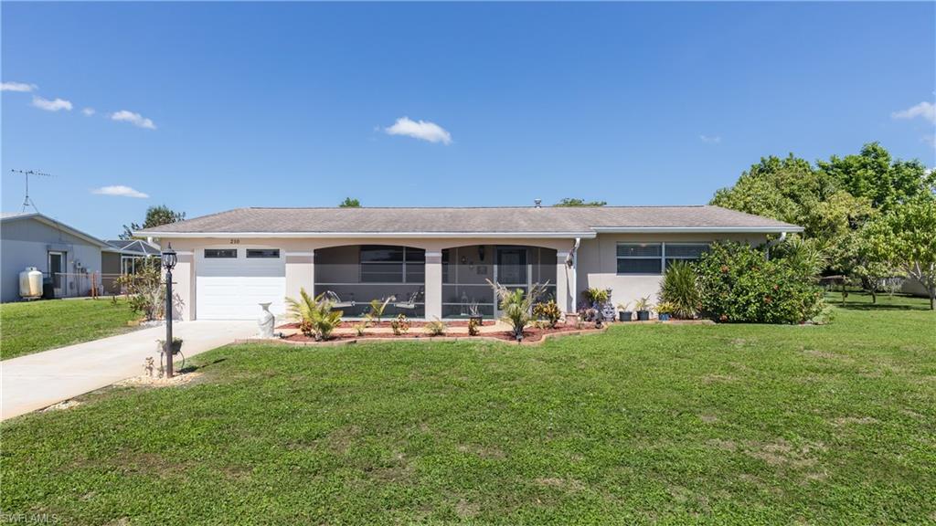 Charming 2 bedroom 2 bath in the WILLOW LAKE SOUTH community that features wide curbed streets, under ground utilities, CENTRAL WATER AND SEWER, and NO HOA. Entertain in the large FENCED yard with GAZEBO and brick FIRE PIT  and watch the otter and fish in the CREEK. Updates include:ROOF 2015,  A/C  2021 and recently remodeled BATHROOMS. Large added side entrance for your BOAT or RV. Close to schools, shopping, walking distance to Veterans Park and only 9 miles to the airport.