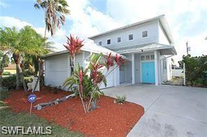 Seller Financing Available!!Just Reduced! No HOA fees! Live in Desirable North Naples! Beautiful 3 bedroom, 2 bath. House was renovated with Beautiful new Lanai and second story entrance with 2nd private Lanai. Plenty of parking and garage space. Owner willing to hold the Mortgage. Tennis, racquetball and basketball courts are just a short walk away at Pelican Bay Community Park as are nearby restaurants at the Ritz Carlton, Turtle Club, The Lighthouse and La Playa. A short drive up the street expands your social options exponentially with even more fine restaurants plus movie theaters, upscale shopping and more at the fabulous Mercato, Pelican Bay Marketplace, or Pavilion Shops. All of this enhanced by the natural backdrop of Vanderbilt Beach and Delnor Wiggins State Park, recently named one of the Top Ten Beaches in the US. You can be certain that this home will inspire wonderful and lasting vacation memories for you, family and guests.
