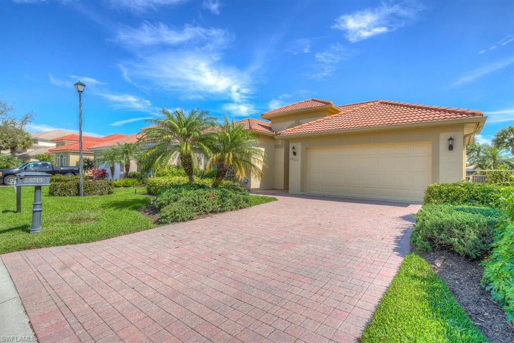 BEST VALUE price per square foot for this immaculate pool home offering lovely lake 
& golf views over signature hole. NO Need to wait...VERY RARE GOLF MEMBERSHIP AVAILABLE IMMEDIATELY....don't sit on the multi year waiting list...golf today here! Move right in this 3 bedroom 3 bath pool/spa home w/ large open kitchen, upgraded appliances, tank less water heater, whole house generator $20,000 value, hurricane panels t/o entire home, hardwood flooring in the living and dining areas,newer 4 ton AC,reverse osmosis system.  A spacious master suite goes right out to your private pool pool area so peaceful, relaxing & wonderful entertaining.  Palmira Country Club is an amenity rich gated community centrally located close to shopping, entertainment, restaurants and beach access. Residents have access to the lovely Renaissance Center complete with a lagoon-style pool, olympic sized lap pool, spa, restaurant, & well equipped fitness center. Palmira Country Club also offers a 41,000-square-foot clubhouse, dining room, grill, pro shop, billiards, a very active social and tennis/pickleball program and a Gordon Lewis designed 27-hole championship golf course. This home is easy to show!