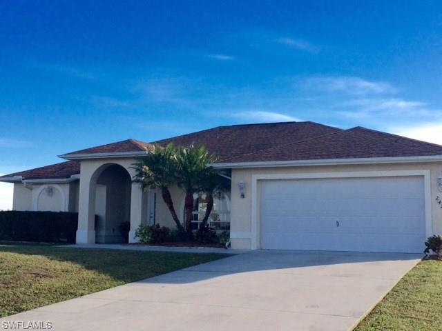 Home sweet home is what you'll be saying when you sink your feet into this 3 bedroom 2.5 bath POOL home situated on a freshwater canal in NE Cape Coral.  As you enter through the double front doors, you'll enjoy views of the pool as it overlooks the freshwater canal.  The large 8x10 sliders can be opened up to bring the outdoors in and expand your living space.  The interior of this home features vaulted ceilings, large kitchen with newer stainless Whirlpool appliances, open concept from kitchen to family room, large master retreat with his & her walk-in closets and 5 piece bath, and a separate dining & living room for more entertaining space.  Sip your morning coffee and watch the sun rise over your back lanai, and enjoy the sunsets from your front porch.  This home is priced to sell quickly, so call today for your private tour!