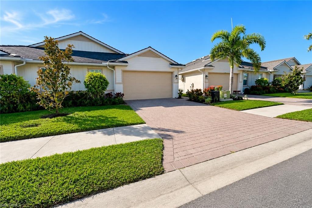 Experience comfortable Florida living in this beautifully maintained attached villa with serene lake and preserve views, located in the highly desirable Enbrook community of South Naples. Offering 2 bedrooms, a spacious den, 2 full bathrooms, and a 2-car garage, this move-in ready smart home combines style, comfort, and convenience.

The open-concept floor plan features tile flooring throughout the main living areas, carpeted bedrooms, and an abundance of natural light. The versatile den is ideal as a home office, media room, or guest space. Wake up to peaceful water views from the primary suite, complete with a walk-in closet and a private en-suite bathroom featuring dual vanities. Enjoy your morning coffee or unwind in the evening while taking in the tranquil lake and preserve views.

As a resident of Enbrook, you'll have access to exceptional resort-style amenities, including a community pool, pickleball and tennis courts, a state-of-the-art fitness center, and a beautifully appointed clubhouse with a full kitchen, billiards, and gathering areas.

Ideally situated in South Naples, this home is just minutes from shopping, restaurants, Gulf beaches, downtown Naples, and Marco Island, offering the perfect balance of relaxation and convenience.

Available for annual lease. Don't miss this opportunity to enjoy low-maintenance, resort-style living in one of South Naples' most sought-after communities.