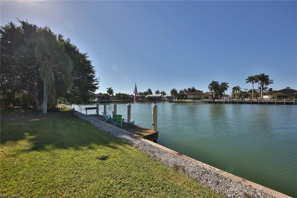 Build your dream home on this soon to be vacant lot. This over sized .33-acre lot has 180 feet of water frontage as well as Southwest exposure. New seawall being constructed.