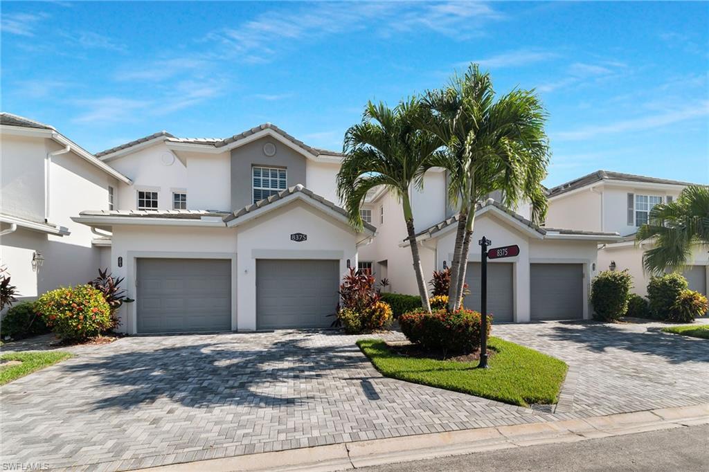 This beautiful, furnished coach home is located in the gated community of Fiddler's Creek featuring two bedrooms, two baths and a garage. This first-floor condominium has newer appliances, including a washer and dryer and is conveniently located directly across from the village pool for easy access to relaxation and neighborhood get-togethers. Recently updated with impact windows and sliders, a new roof and painted interior and exterior. This home offers modern convenience and peace of mind. Whether you're lounging on the private screened lanai, taking in the serene preserve views or preparing a gourmet meal in the upgraded kitchen, this home has it all. The driveway and walkway have new pavers. Capital CDD is paid in full. A life of luxury is ensured in this residence, enhanced by the beautiful 54,000-square-foot club and spa, full-service spa, fitness center complete with personal trainers and fitness classes, three swimming pools, championship golf courses, bocce, restaurants, six tennis courts and 10 pickleball courts with competitive teams. Fiddler's Creek is close to Marco Island Executive Airport, beaches, shopping, restaurants, boating and easy access to downtown Naples' 5th Avenue. Optional golf and beach memberships are available.