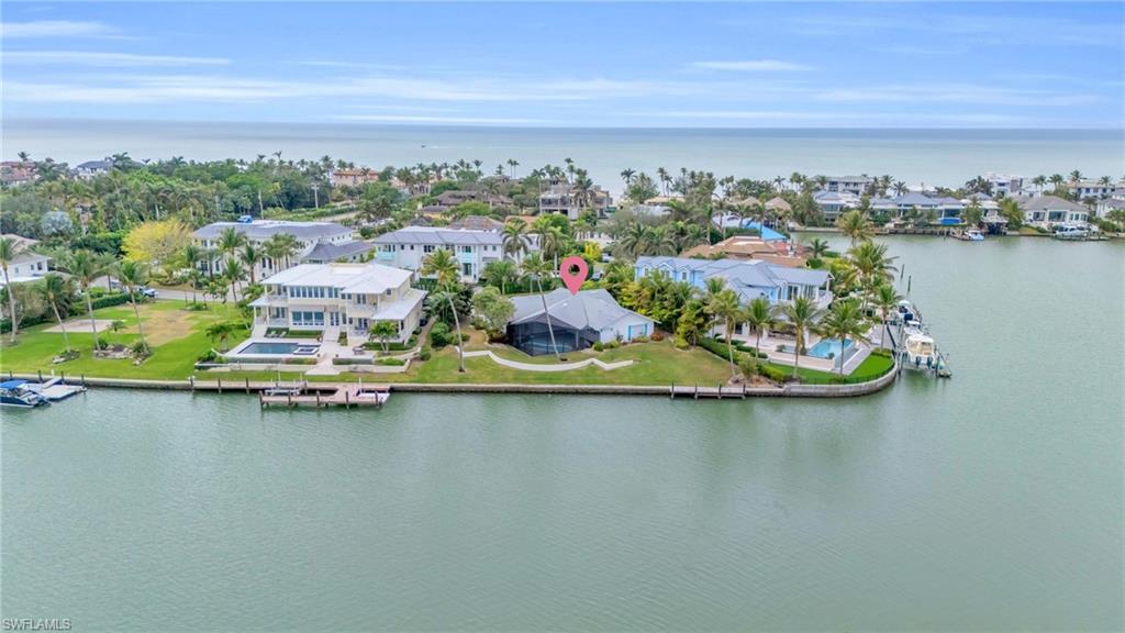 Nestled within the prestigious Port Royal enclave of Sabre Cay, discover an unparalleled opportunity to build your dream home. Set on a .48-acre lot with 156 feet of frontage, this exceptional property provides direct access to the Gulf of Mexico in mere minutes. Ideally positioned just off Gordon Drive, this prime location is moments from Naples’ pristine white-sand beaches, world-class dining, and luxury shopping.. Additionally, the property includes an associate membership to the prestigious Port Royal Club, enhancing your lifestyle with world-class amenities