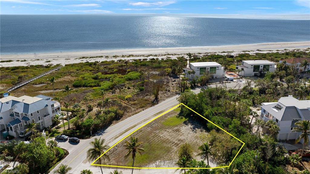 A rare opportunity on Sanibel’s coveted East End, this vacant parcel is listed separately and must be purchased in combination with the residence at 460 East Gulf Drive. Each property carries its own list price. The total purchase price is the combined amount of both listings. The parcels will not be sold individually.
Located just steps from beach access and adjacent to a canal-front home with a private boat lift, this lot meaningfully enhances the value and versatility of the overall offering. It provides added privacy, space for future improvements, expanded outdoor living potential, or long-term investment flexibility.
Vacant land in this location is exceptionally scarce. When paired with a beautifully updated waterfront residence, this parcel completes a unique multi-parcel coastal retreat near the Sanibel Lighthouse, marinas, dining, shopping, and miles of Gulf shoreline.