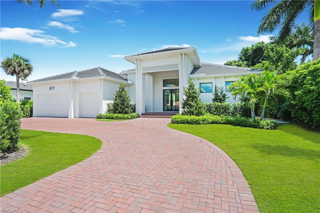 Built by PGI Homes, one of the finest builders in Florida, this Park Shore masterpiece relaxes you from the moment you walk in. The home features the finest details you could imagine, conceptualized by the greatest minds in the design and building industry. With beautiful shiplap walls, perfect white oak floors throughout, and one of a kind bespoke lighting, this perfectly sized home leaves nothing to be desired. Outside a stunning pool and spa with a massive beautiful shell stone pool deck await endless days of relaxing with family and friends. Every detail in this home has been looked after, the kitchen features the finest quality double stacked cabinetry, Cambria Britannica countertops, and top of the line Thermador appliances. You will truly enjoy and marvel at the details of this home for years to come. Spend quality time with the ones you hold dear, and make this truly stunning home yours, before its gone.