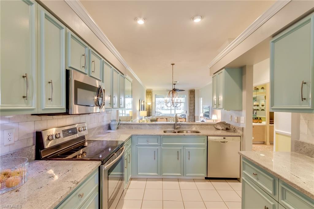 Absolutely Fabulous! TROPICAL ELEGANCE at its finest. This sought-after bundled GOLF and TENNIS community is nestled in the desirable Country Creek development. Enjoy your morning coffee and a sunrise from your front lanai just off the eat-in kitchen. This gorgeous TURN-KEY villa was previously owned by a professional interior designer, and it shows! Many design features have been added including crown molding in all rooms, custom window decor, and granite top vanity in master en-suite. Kitchen features granite counter tops, top of the line stainless steel appliances and a whisper-quiet Bosch dishwasher. This 2+ bedroom model offers a highly sought after desirable floor plan with a separate, ENCLOSED DEN. 9 ft. ceilings give a spacious, open feel with lots of sunlight. Enjoy dinner and a sunset from the 2nd lanai while overlooking the 9th green. The vibrant Country Creek community includes an 18 hole executive golf course routed along 12 lakes, 5 pools, 5 tennis courts, recently updated Fitness Center/Spa, full service clubhouse with restaurant/bar and ample social activities. Close proximity to great shopping, restaurants, medical facilities, airport, theater and sports venues.