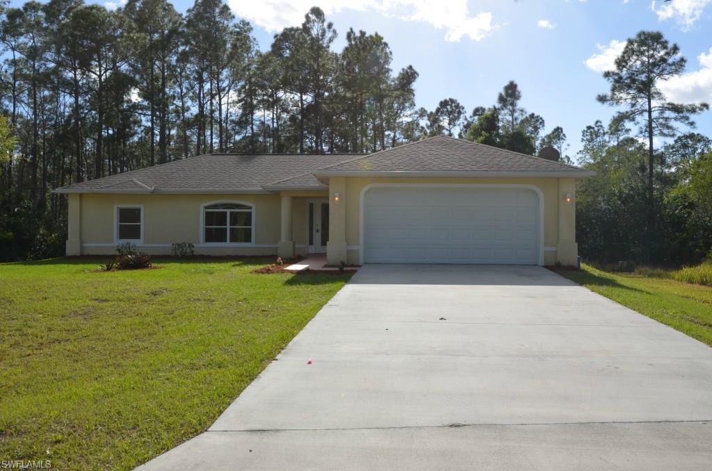 Serenity!!! This beautifully remodeled 4/2 sits on a quiet cul de sac in the popular Greenbriar neighborhood of Lehigh Acres.  Notice the beautifully-landscaped entry way into your spacious, tiled living area. All new fans and fixtures appoint the entire house, as you will notice especially in your bright and inviting kitchen, with new, modern cabinetry.  The whole home is freshly-painted in neutral coloring, giving this already large house an even more open feeling. All of the bedrooms sport fresh carpet as well.  Plenty of space for the whole family.  Step out back to enjoy a private wooded-area, perfect for cookouts and get-togethers. Don't miss out on getting to call this beautiful house, "home." Call for your showing today!