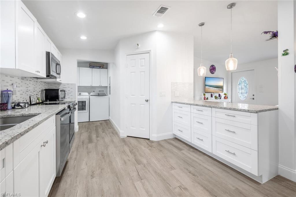 Enjoy the rare combination of space, privacy, and convenience. Situated on nearly 3 acres of 100% upland land with no HOA or restrictions. Whether you need room to park trucks, trailers, RVs, or work vehicles, keep horses or other animals, or simply want the freedom to use your property your way, this beautifully remodeled 3-bedroom, 2-bath home, fully updated in 2024, delivers the flexibility today’s homeowners are looking for.

Recent upgrades include a 2021 roof, brand-new A/C system, impact-resistant windows and doors, reverse osmosis water system, tankless water heater, and a newly paved asphalt driveway. The property is partially fenced and features a new front porch with ramp along with a new screened back porch, offering comfortable spaces to relax and unwind.

Inside, the open-concept kitchen and dining area showcase new cabinetry, granite countertops, tile backsplash, new stainless-steel appliances, and luxury vinyl plank (LVP) flooring throughout, creating a modern and functional space for everyday living and entertaining. Both bathrooms have been tastefully updated with high-end finishes.

Ideally located on Randall Blvd near Everglades Blvd, this home is minutes from the rapidly developing Immokalee Rd corridor, top-rated schools, and less than 5 minutes from Publix, CVS, local dining, shopping, and Big Corkscrew Island Regional Park. With new commercial development underway, this area continues to grow, making it a smart place to invest.

Schedule your private tour today and experience the freedom, space, and convenience this property offers.