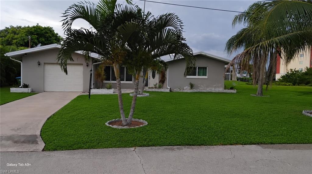 Experience the best of Southwest Florida waterfront living in this charming Gulf-access home located in the highly desirable Yacht Club area of Cape Coral! This 2-bedroom, 2-bath residence offers direct sailboat access with no bridges to the Caloosahatchee River and Gulf of Mexico, making it a dream for boating enthusiasts. Enjoy relaxing water views from the screened lanai, a spacious backyard, and a bright, functional floor plan featuring an eat-in kitchen, generous living area, ample closet space, and an attached one-car garage. Ideally situated just moments from the Cape Coral Parkway Bridge, you'll enjoy quick and convenient access to both Fort Myers and Cape Coral, making commuting, dining, shopping, and entertainment a breeze. Just minutes from Downtown Cape Coral and the Yacht Club area, this home offers the perfect combination of comfort, convenience, and waterfront living. Lawn maintenance is included. Don't miss this opportunity to lease a home in one of Cape Coral's most sought-after neighborhoods!