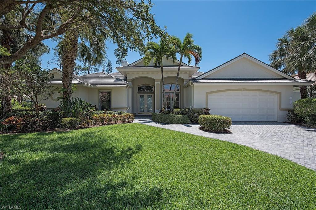 Introducing this spectacular estate located in the renowned community of Lely Resort — The Players Club Fee is not required. Enjoy all-day sunlight and southern lake views from the expansive lanai featuring a pool and spa, an outdoor shower, pool bath, summer kitchen and ample seating areas. The interior is decorated with volume ceilings, crown molding, plantation shutters, fireplace, tile on the diagonal and a great room. The kitchen is appointed with granite counters, white cabinetry, and stainless steel appliances. Relax with friends and family in the living room, family room or spacious lanai. The master bedroom features an additional room and a large en-suite with dual walk-in closets, dual sinks, two water closets, a soaking tub and glassless walk-in shower. Additional features include a security system, storm protection and surround sound speakers. Take advantage of this spectacular residence located is an established family friendly neighborhood. Lely Resort offers resort-style amenities including three pools, formal and informal dining, a fitness center, spa and so much more!