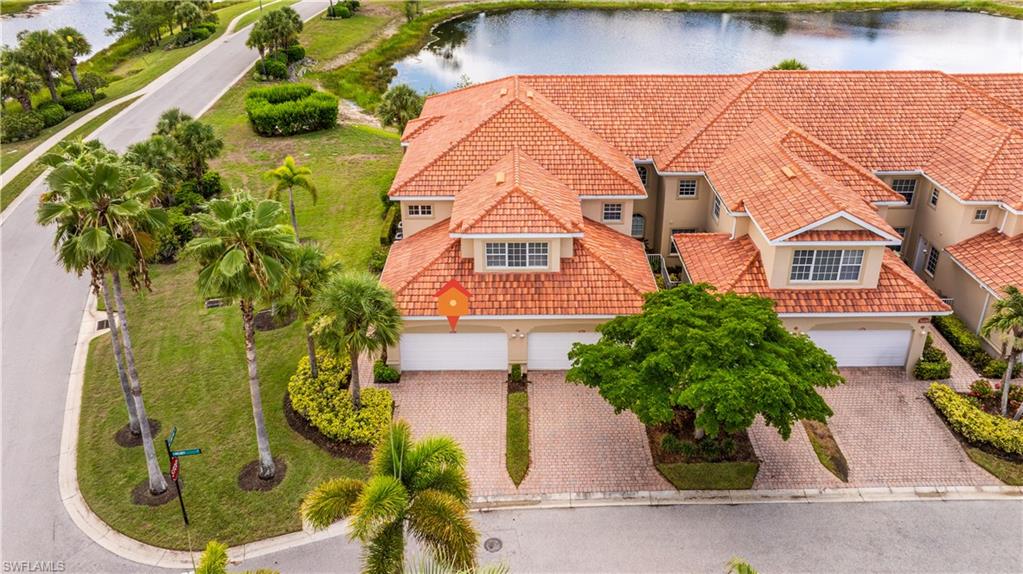 Rarely available END-UNIT carriage home offering the LARGEST floor plan in Bell Tower Park! This beautifully updated second-floor carriage home features 2,338 square feet, an attached 2-car garage, breathtaking east-facing LAKE VIEWS, and is ideally situated in a NO FLOOD ZONE within one of Fort Myers' most desirable gated communities. Designed to live like a single-family home, this spacious 4-bedroom, 3-bath residence showcases soaring 10-foot ceilings, oversized living spaces, abundant natural light, and an open-concept layout ideal for both everyday living and entertaining. The expansive wraparound screened lanai serves as an extension of the home, offering multiple seating and dining areas with panoramic lake and preserve views and no neighboring buildings interrupting your scenery. The thoughtfully designed floor plan offers oversized bedrooms, large walk-in closets, abundant storage throughout, and a full-size laundry room complete with a utility sink, built-in cabinetry, and full-size washer and dryer. The impressive 16' x 16' fourth bedroom provides endless flexibility as a home office, media room, fitness room, playroom, or private guest suite. Best of all, all living space is conveniently located on one level. Beautifully maintained and move-in ready, this home features porcelain tile flooring throughout (NO CARPET), a NEW TILE ROOF (2023), newer A/C,  stainless steel appliances, crown molding, fresh interior paint, updated lighting/fans, designer kitchen backsplash, and numerous additional upgrades. Bell Tower Park is one of Fort Myers' hidden gems, offering a gated, pet-friendly, resort-style lifestyle with beautifully landscaped grounds, scenic lakes, wide tree-lined streets, and exceptional amenities. Residents enjoy two heated pools and spa, an elegant clubhouse, fitness center, tennis, pickleball, basketball courts, and private access to John Yarbrough Linear Park with miles of walking and biking trails. HOA dues include wifi, cable, exterior insurance, and MORE!
Perfectly located in the heart of Fort Myers, you're just minutes from Bell Tower Shops, Gulf beaches, top-rated restaurants, healthcare, Barbara B. Mann Performing Arts Hall, downtown Fort Myers, and Southwest Florida International Airport. NO FLOOD insurance required, no CDD fees, and no city taxes.
Offering the community's LARGEST floor plan, premium END-unit privacy, exceptional storage, full tile flooring, spectacular lake views, and a location that's second to none, this is a rare opportunity to enjoy maintenance-free Florida living at its finest.